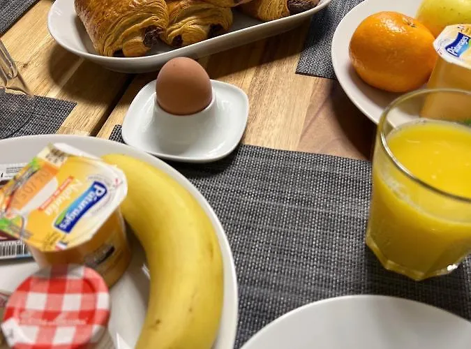La Maison Charentonneau Couette-café